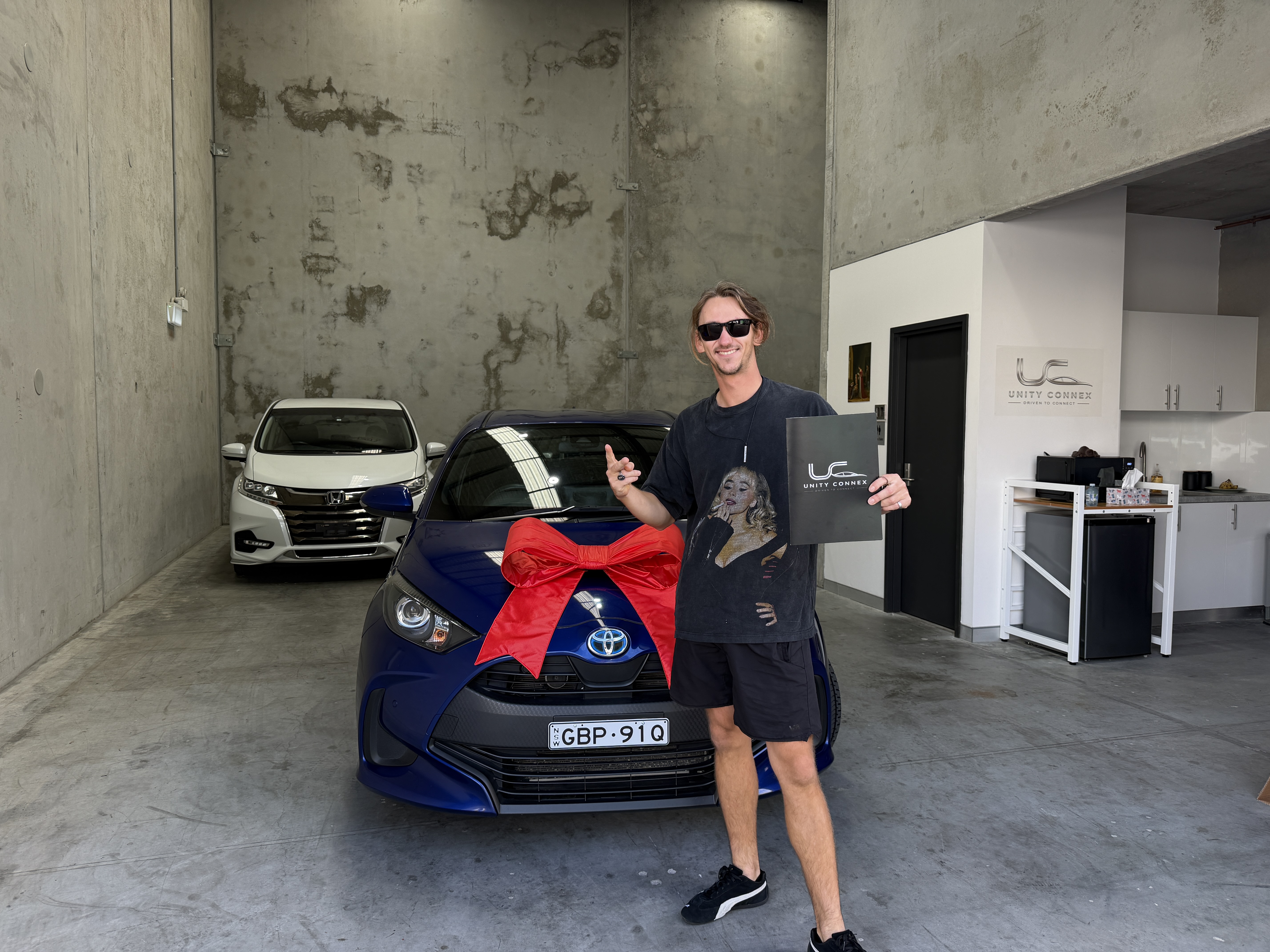 Cooper with his 2021 Toyota Yaris