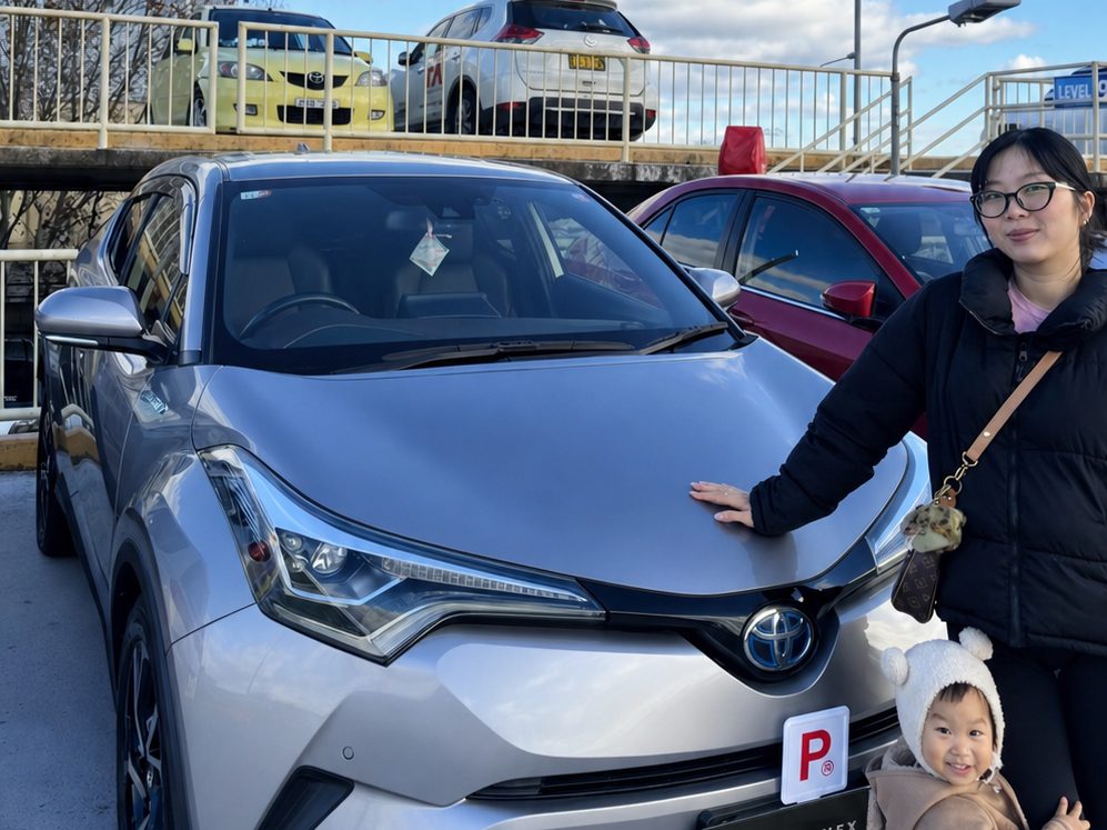 Tony celebrating delivery of Toyota C-HR Hybrid at Unity Connex